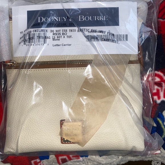 BONE COLOR Dooney and Burke Pebble Grain Letter Carrier in Bone color brand new - Picture 2 of 4